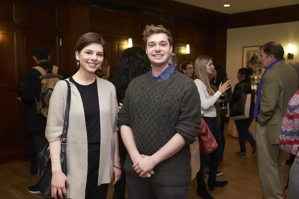 Amy Russo, 2017 Hunter College Student Fellow (left) and Max Toomey, 2017 Columbia University Student Fellow, meet after the refugee reporting panel at Roosevelt House in New York. Image by Matt Capowski. United States, 2017.