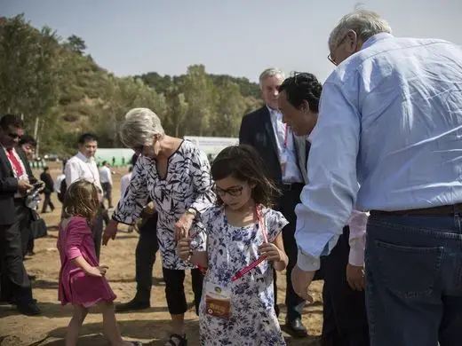 Ambassador Terry Branstad and his wife Chris Branstad bring their granddaughters, Stella and Sofia Costa with them to the groundbreaking ceremony for the China-US Demonstration Farm on Saturday, Sept. 23, 2017, in Luanping County, Hebei, China. Image by Kelsey Kremer. China, 2017.