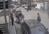 Security camera still of attack in Simferopol on Dimiter Kenarov, Pulitzer Center grantee journalist, who had been photographing a midday raid against a TV studio—part of the Associated Press network he later learned. The video footage taken by chance by the security camera was later traced and uploaded on YouTube by Ukrainian journalists. Ukraine, 2014.