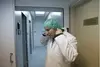 David Sher, CEO of Elite-IVF gets ready to enter a sterile lab in Cyprus.