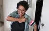 Marta Rojas dons a 51-year-old blouse from Cuba's July 26 Movement.