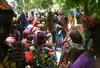 Women line up so their children can be measured, weighed and treated for malnourishment at a World Vision health clinic near Dakoro in east Niger. Image by Ruth Moon. Niger, 2010.