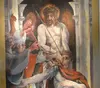 A view of Luis Lazo's painting of Jesus and Pilate in San Salvador. Image by Roberto Lovato. El Salvador, 2011.