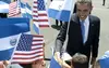 President Obama greets young school children upon arrival in San Salvador, El Salvador, Photo: AUL LOEB/AFP/Getty Images 