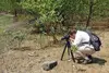 Sean Gallagher shooting with a Slik tripod. China, 2010.
