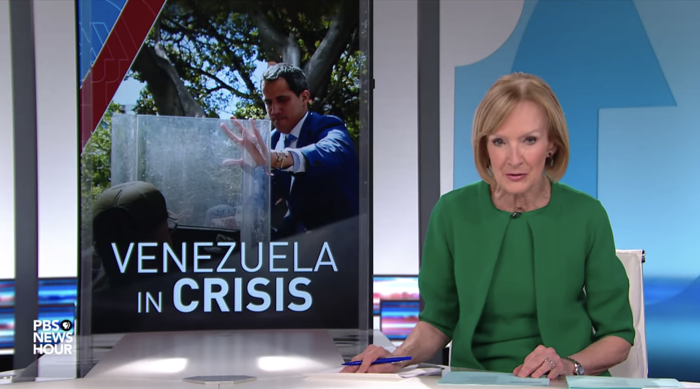 PBS NewsHour covers the ongoing crisis in Venezuela. Image by PBS NewsHour. United States, 2019. PBS NewsHour covers the ongoing crisis in Venezuela. Image by PBS NewsHour. United States, 2019.