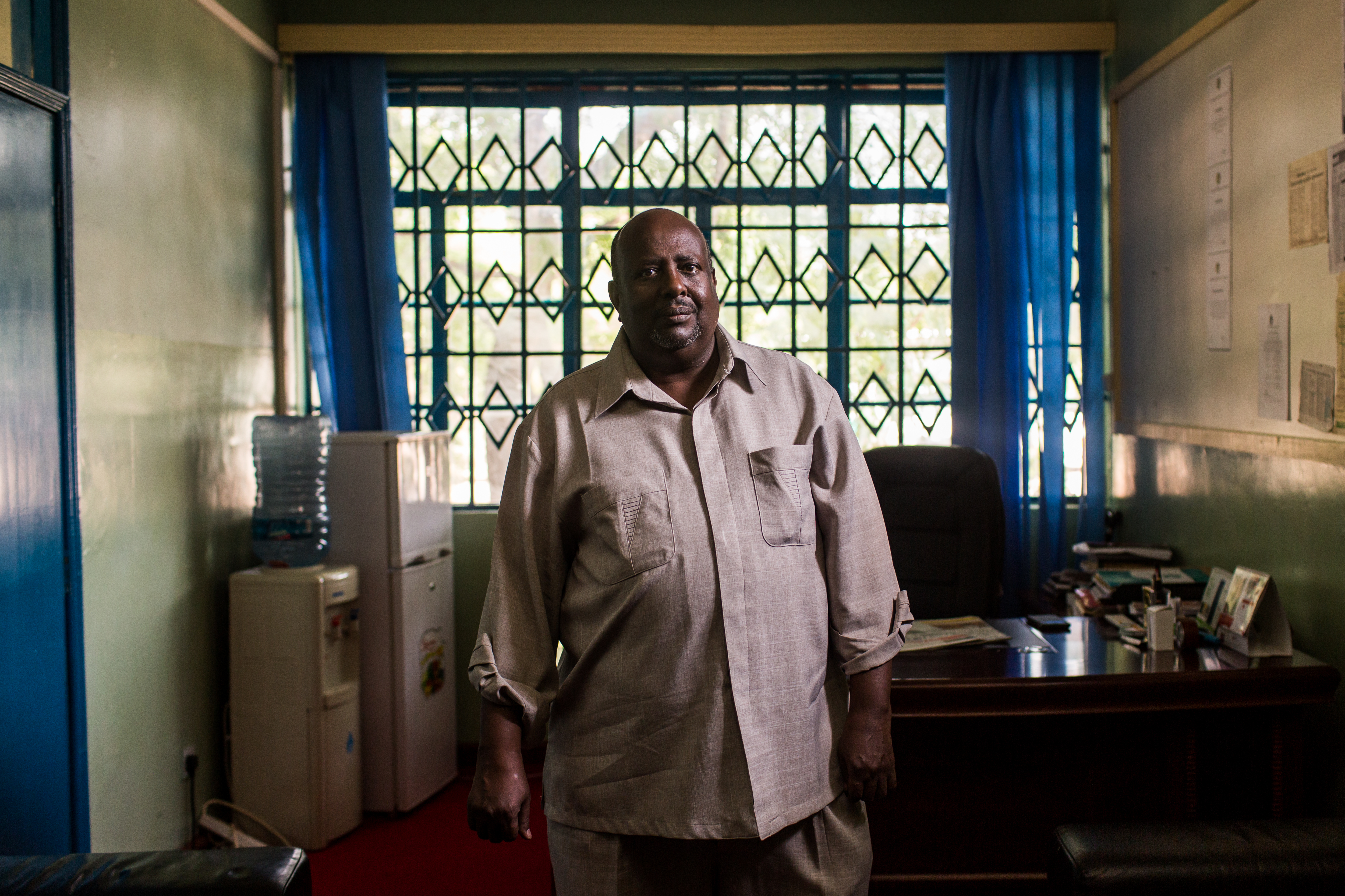 Garissa University Principal Ahmed Osman Warfa has overseen the university through its opening, the Al Shabab attack that killed 148 people on campus last year, and now its reopening after being shuttered for 10 months. He calls the university a "lifeline" for the marginalized region. Image by Will Swanson. Kenya, 2015. Garissa University Principal Ahmed Osman Warfa has overseen the university through its opening, the Al Shabab attack that killed 148 people on campus last year, and now its reopening after being shuttered for 10 months. He calls the university a "lifeline" for the marginalized region. Image by Will Swanson. Kenya, 2015.