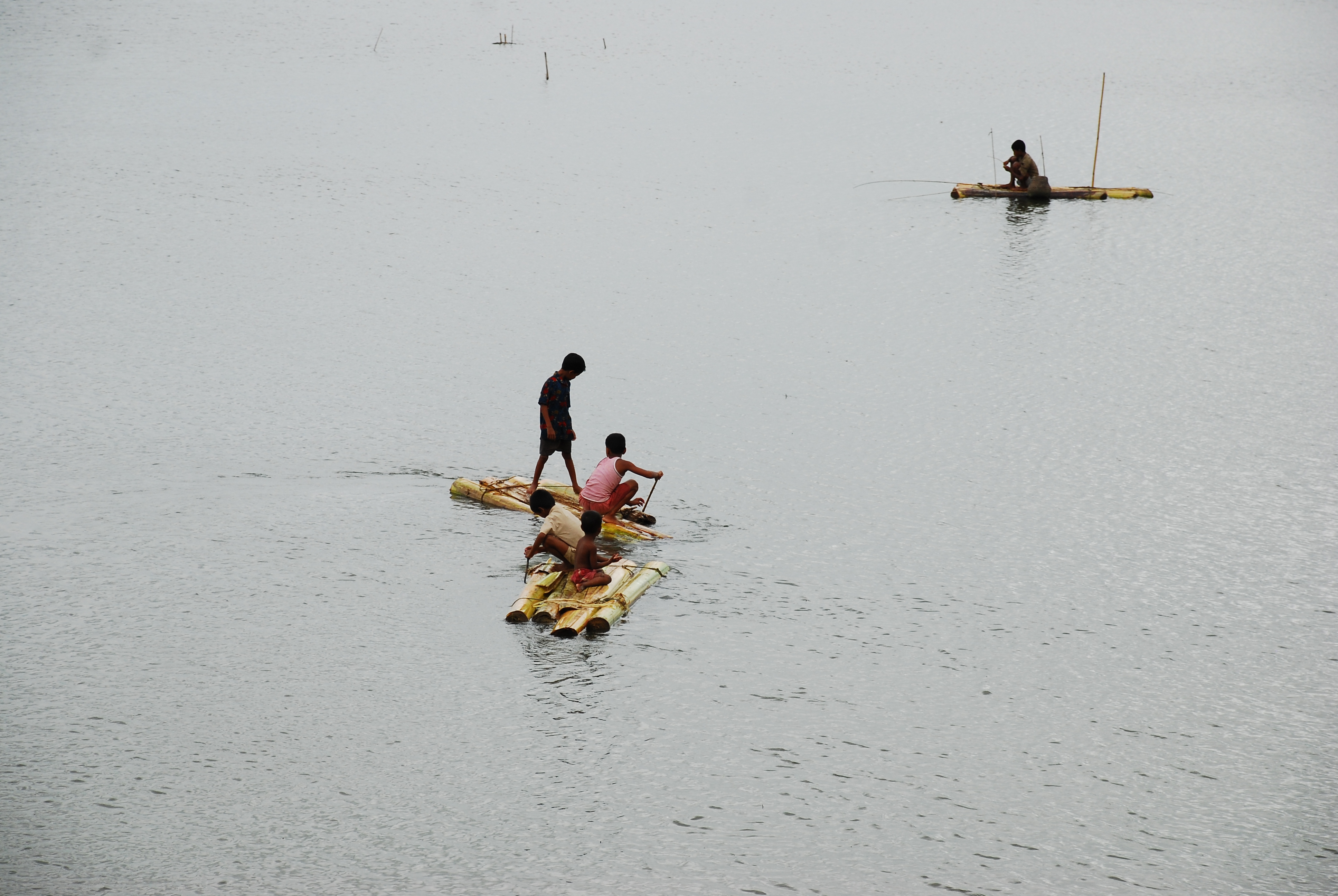Children play with old rafts over flooded fields in rural Bangladesh. Image by Amir Jina / CC. Bangladesh, 2009. Children play with old rafts over flooded fields in rural Bangladesh. Image by Amir Jina / CC. Bangladesh, 2009.
