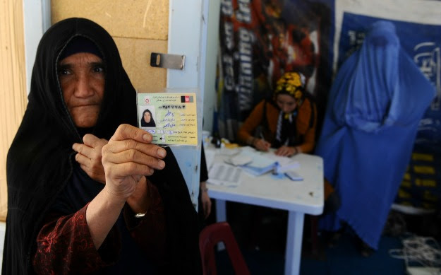 One woman, one vote. An Afghan voter and her ID. Image by Aref Karimi/AFP/Getty Images. Media file: unnamed.jpg
