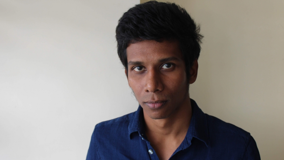 Than Toe Aung faced harassment and discrimination as a Muslim in Myanmar his whole life. Now he's using slam and spoken word poetry to speak out against hate and unite Buddhist and Muslims in the city of Yangon, Myanmar. Image by Jacob Goldberg/The World. Myanmar, 2019. Than Toe Aung faced harassment and discrimination as a Muslim in Myanmar his whole life. Now he's using slam and spoken word poetry to speak out against hate and unite Buddhist and Muslims in the city of Yangon, Myanmar. Image by Jacob Goldberg/The World. Myanmar, 2019.