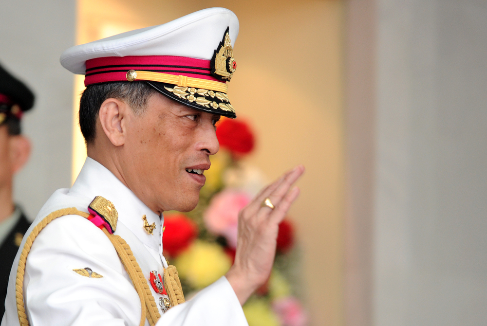 Thai King Maha Vajiralongkorn gestures to people in Bangkok. Image by Shutterstock. Thailand, 2010. Thai King Maha Vajiralongkorn gestures to people in Bangkok. Image by Shutterstock. Thailand, 2010.