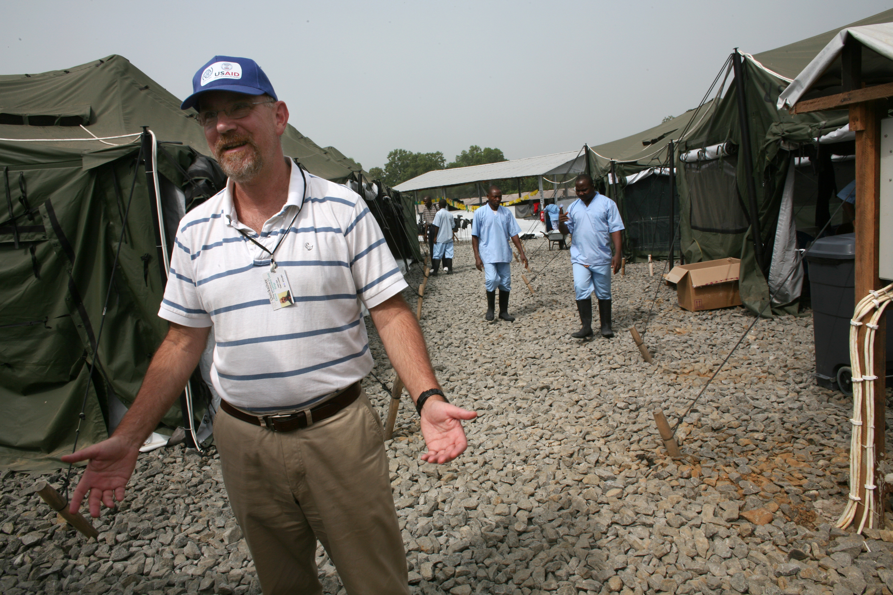 South African aid worker John Nel at an Ebola clinic in Liberia. Image by Cheryl Hatch. Liberia, 2014. Media file: neltalks_9402.jpg