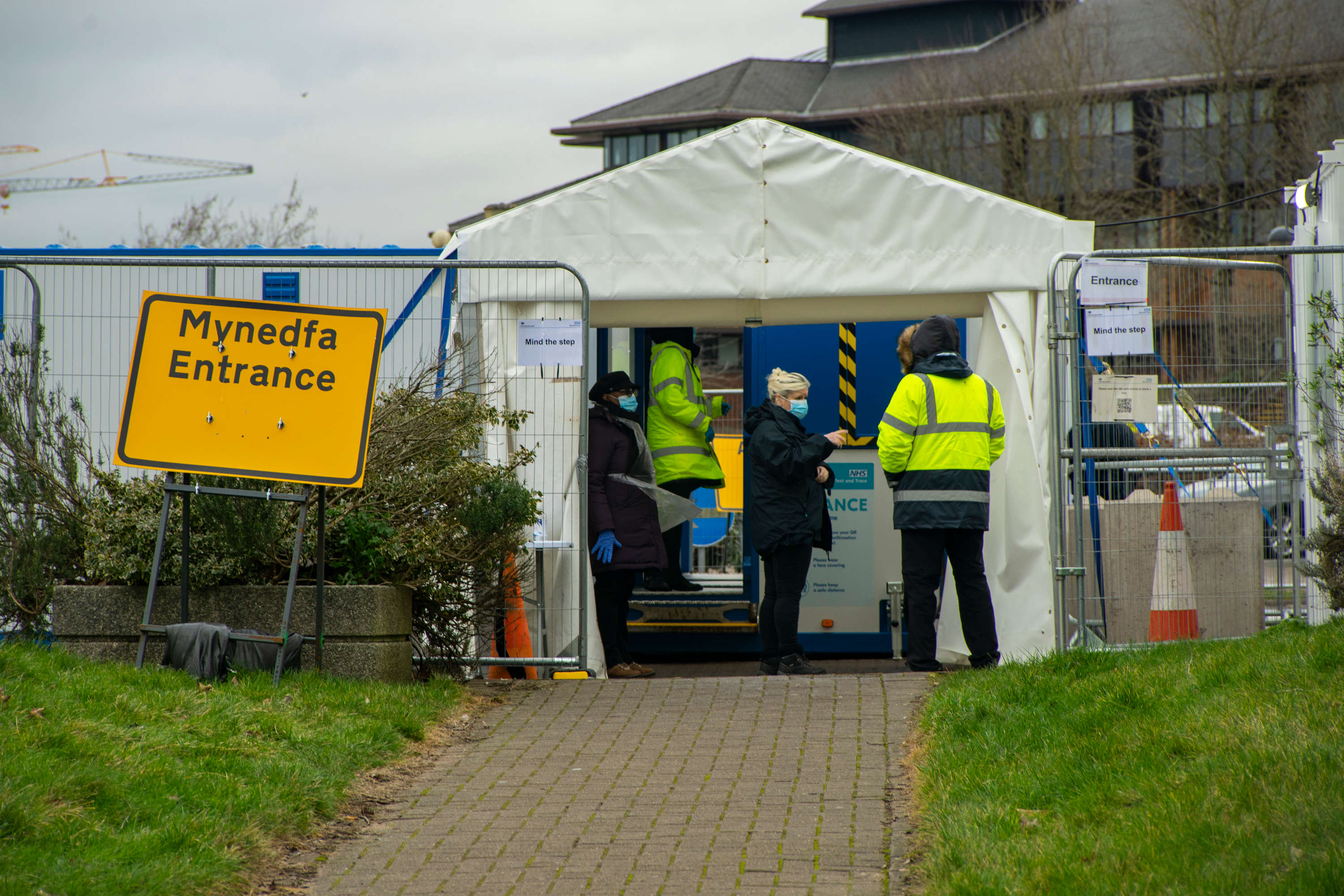 A COVID-19 testing center, which was set up in the car park of City Hall in Cardiff, Wales. Image by GarethWilley / Shutterstock. United Kingdom, 2021. A COVID-19 testing center, which was set up in the car park of City Hall in Cardiff, Wales. Image by GarethWilley / Shutterstock. United Kingdom, 2021.