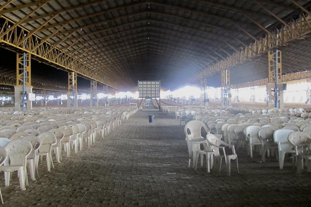 Pentecostalism is growing at an unprecedented rate in countries as diverse as Korea, Nigeria, Guatemala, Brazil and South Africa. If there is one design icon that unites the expanding network of stylistically diverse Pentecostal churches around the globe, it is the comfortable, cheap, and easy to clean white plastic chair. Image from the Atlas of Pentecostalism reporting project. Nigeria, 2013.
