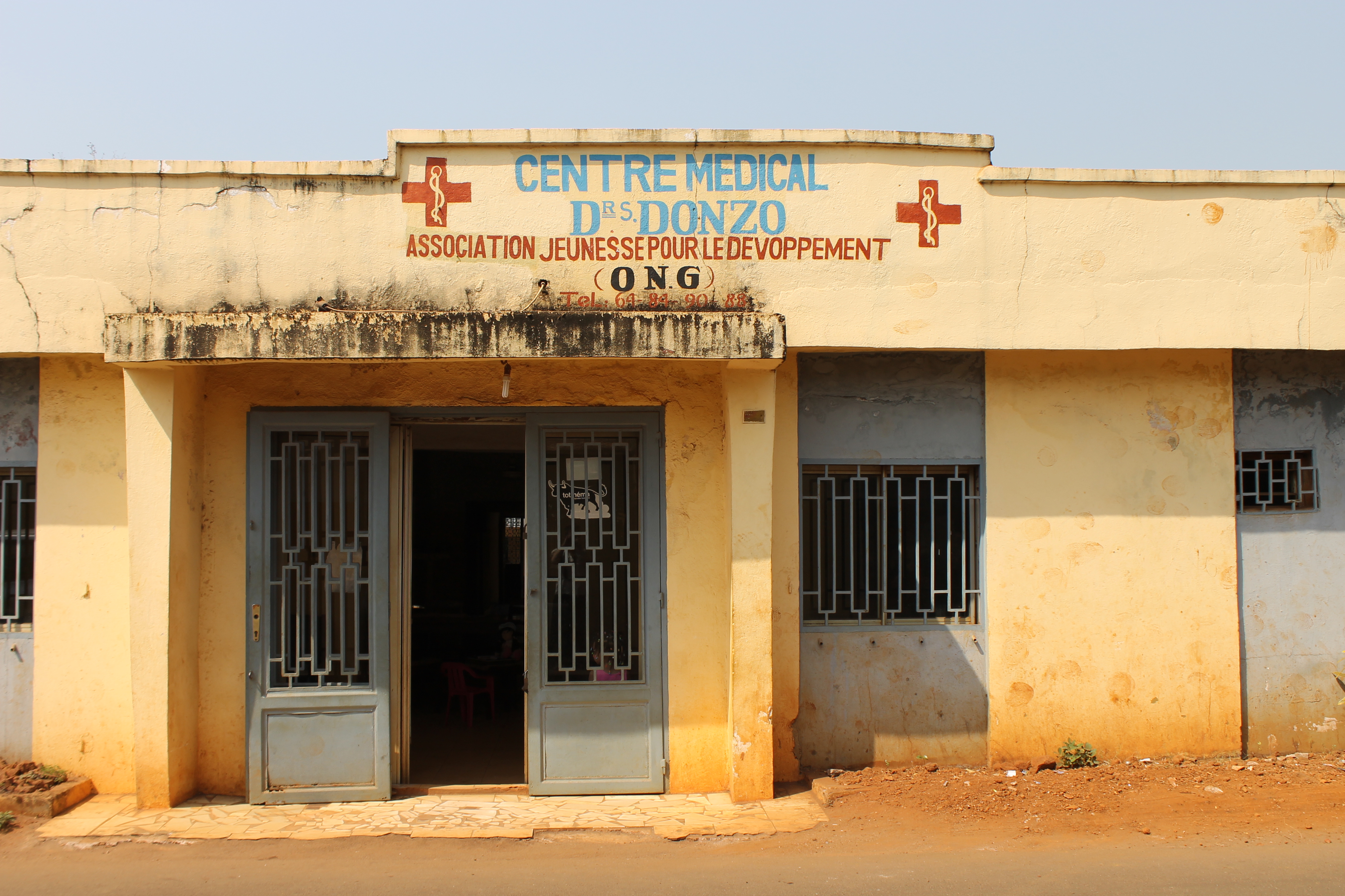 Entrance to the clinic located in the capital city of Conakry. Image by Brandice Camara. Guinea, 2014. Media file: guineamidwives.jpg
