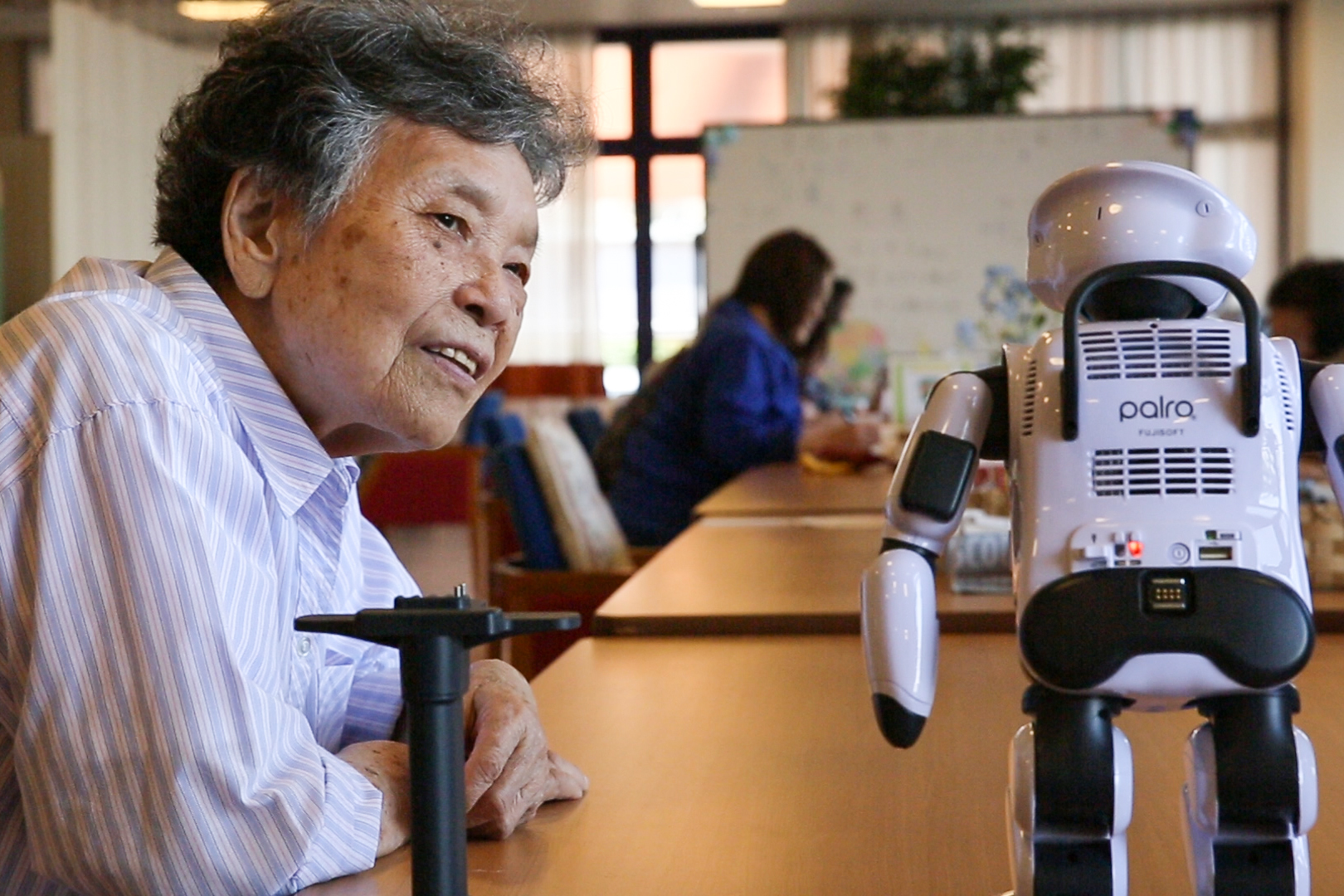 In Japan, where 27.3% of citizens are 65 and older, necessity might be just the mother of invention when it comes to approaches to elder care. This special report looks at how Japan is marrying its demographic shifts with its love of technology to find a way forward. Image by Shiho Fukada. Japan, 2017. In Japan, where 27.3% of citizens are 65 and older, necessity might be just the mother of invention when it comes to approaches to elder care. This special report looks at how Japan is marrying its demographic shifts with its love of technology to find a way forward. Image by Shiho Fukada. Japan, 2017.