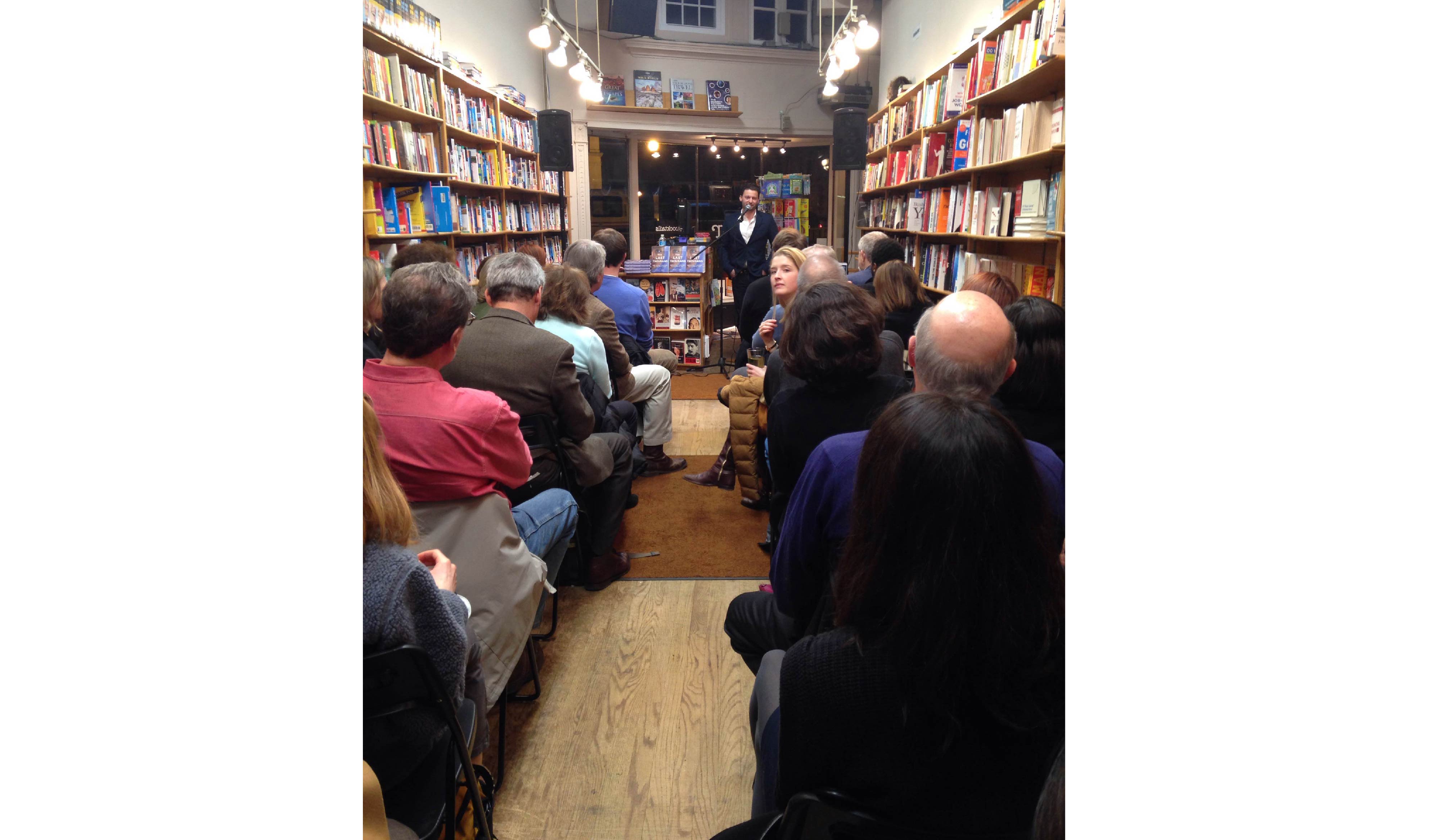 Jeffrey Stern discusses his book "The Last Thousand: One School's Promise in a Nation at War" at Kramerbooks & Afterwords Cafe in Washington, D.C. on February 2. Image by Elana Dure. United States, 2016.