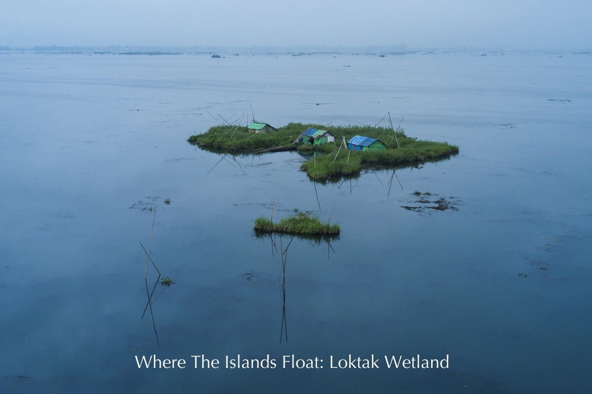 The floating islands of Loktak Lake, known as “phumdis,” home to animals, plants, and an indigenous community, are threatened by development. Image by Neeta Satam. India, 2017. The floating islands of Loktak Lake, known as “phumdis,” home to animals, plants, and an indigenous community, are threatened by development. Image by Neeta Satam. India, 2017.