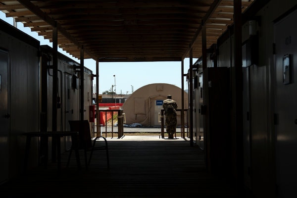 An obsolete airstrip with tents and containerized housing at Guantánamo Bay is the site of the death-penalty trial of the men accused of plotting the Sept. 11, 2001, attacks. Image by Doug Mills / The New York Times. United States, 2019. An obsolete airstrip with tents and containerized housing at Guantánamo Bay is the site of the death-penalty trial of the men accused of plotting the Sept. 11, 2001, attacks. Image by Doug Mills / The New York Times. United States, 2019.