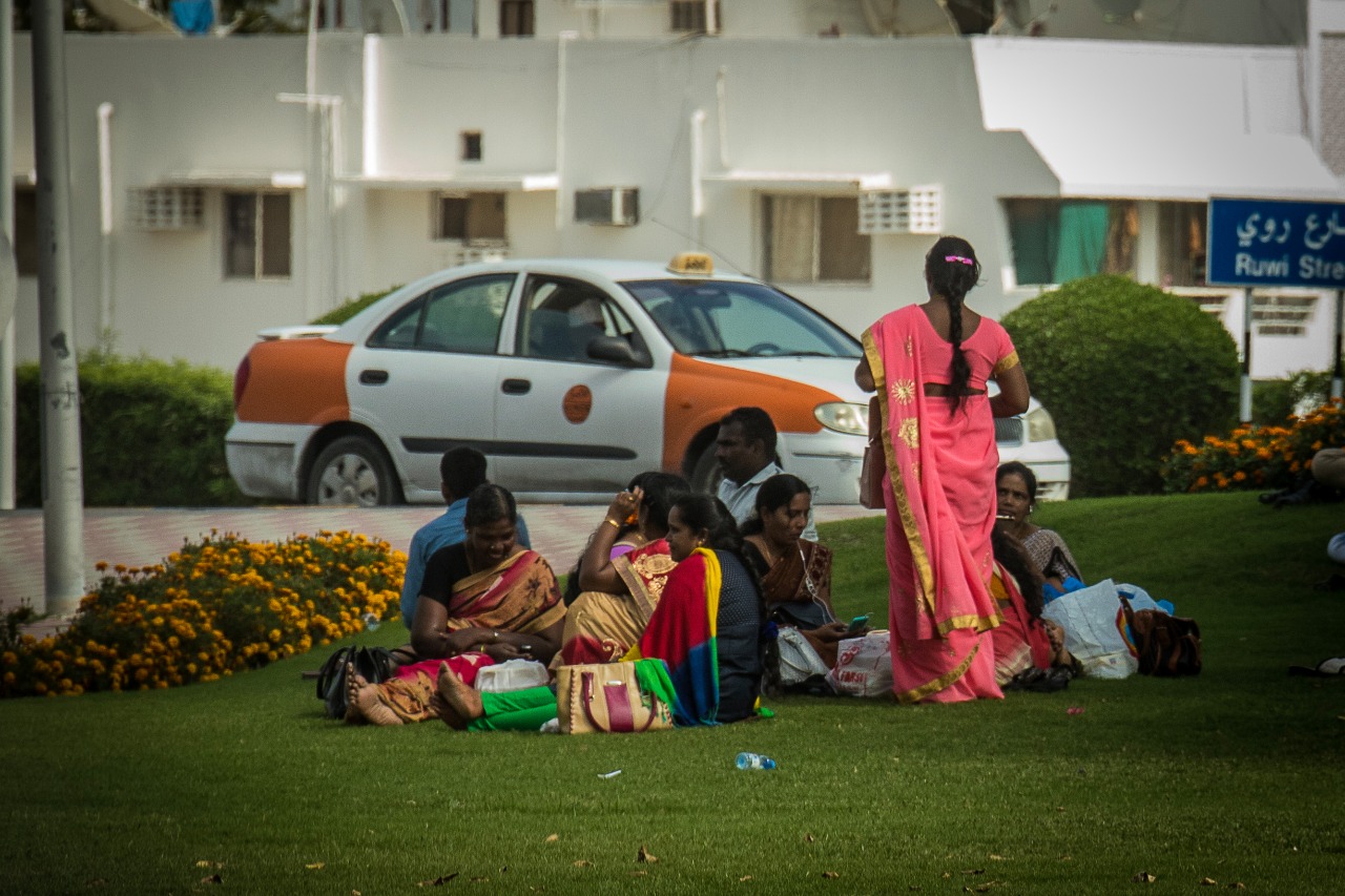 Indian and Sri Lankan domestic workers catch up with each other in a local park in Muscat. Image by Svanika Balasubramanian. Oman, 2019. Indian and Sri Lankan domestic workers catch up with each other in a local park in Muscat. Image by Svanika Balasubramanian. Oman, 2019.