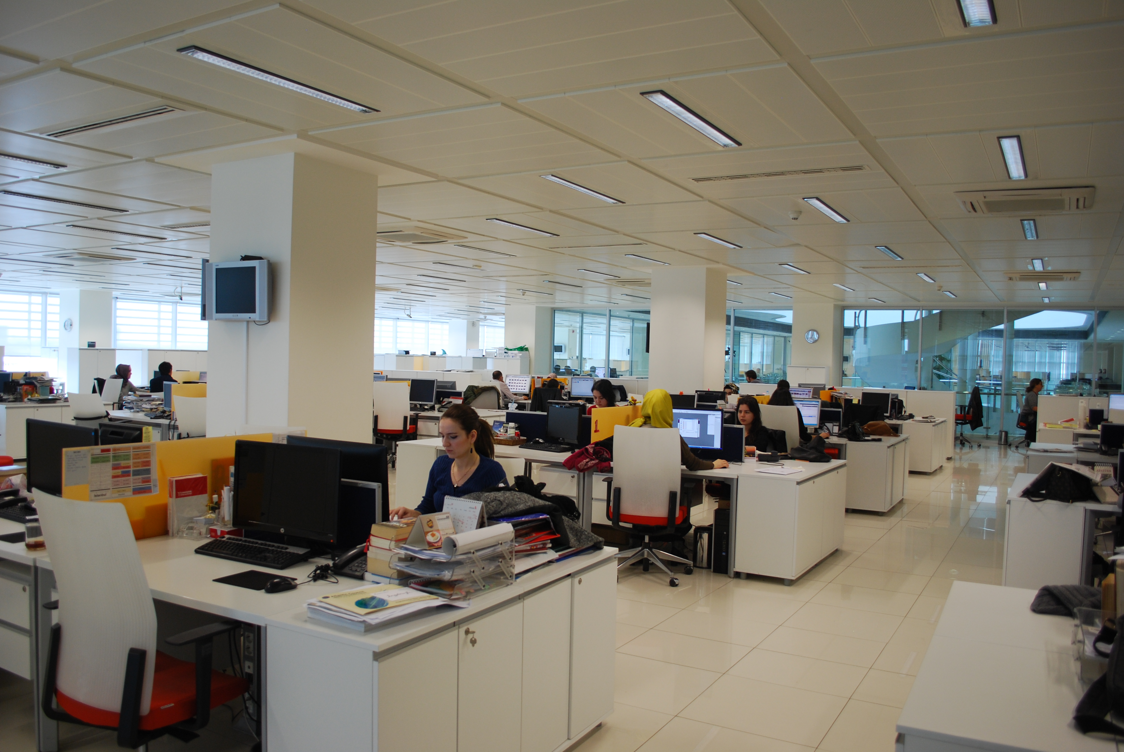 The newsroom of Today's Zaman, with Mahir Zeynalov's empty desk in the foreground. Image by Jenna Krajeski. Turkey, 2013.