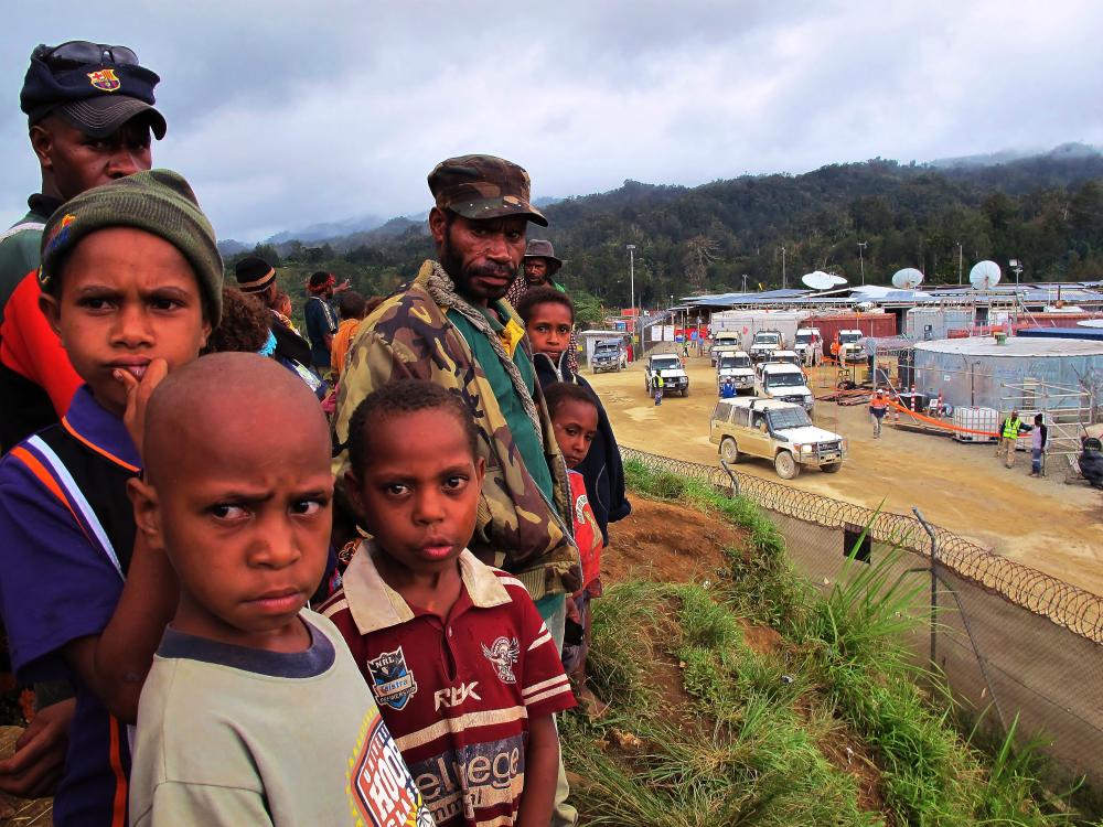 The outcast landowners of Hides village in Hela Province, where the natural gas plant is located. Image by Céline Rouzet. Papua New Guinea, 2012. Media file: 04_outside.jpg
