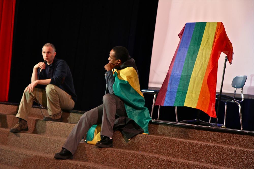 Micah Fink, left, and Maurice Tomlinson discuss "The Abominable Crime" with students at The Arts Academy at Benjamin Rush. Image by Amanda Ottaway. Philadelphia, 2014. Media file: img_2934_0.jpg
