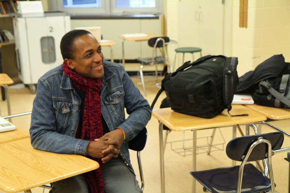 Human Rights lawyer Maurice Tomlinson hangs out at the conclusion of the day's activities in Lorraine Ustaris's English classroom at The Arts Academy at Benjamin Rush. Image by Amanda Ottaway. Philadelphia, 2014.