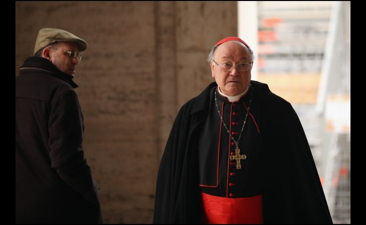 A cardinal walks near St. Peter's Square ahead of Pope Benedict XVI's last public audience on February 25, 2013 in Vatican City, Vatican. Benedict has been the leader of the Catholic Church for eight years and is the first Pope to retire since 1415. He cites ailing health as his reason for retirement and will spend the rest of his life in solitude away from public engagements. Image by Oli Scarff. The Holy See, 2013.