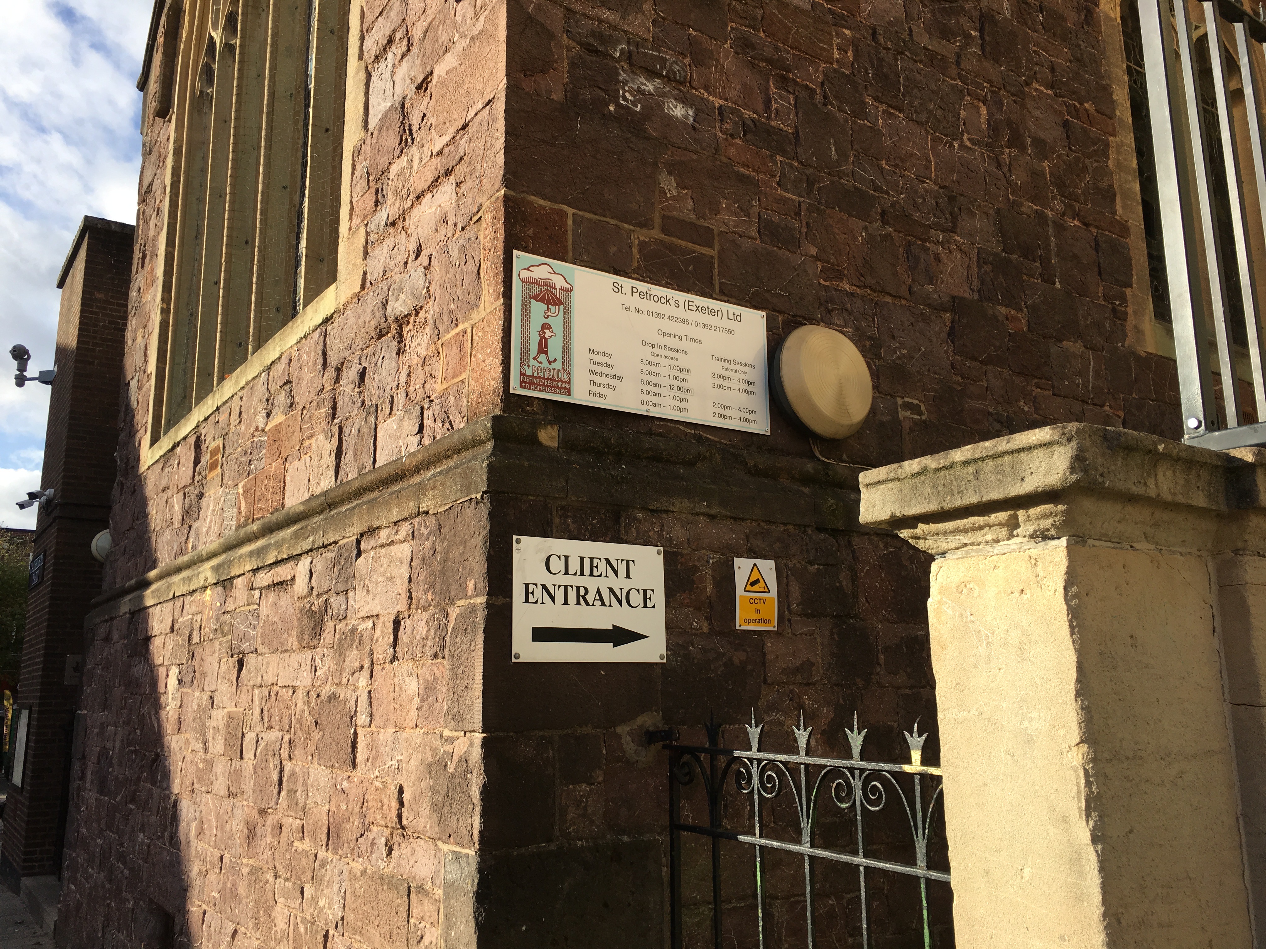 The client entrance to St Petrock's, unobtrusively tucked down the side of a methodist church by the same name. Image by Caitlin Bawn. England, 2016. The client entrance to St Petrock's, unobtrusively tucked down the side of a methodist church by the same name. Image by Caitlin Bawn. England, 2016.