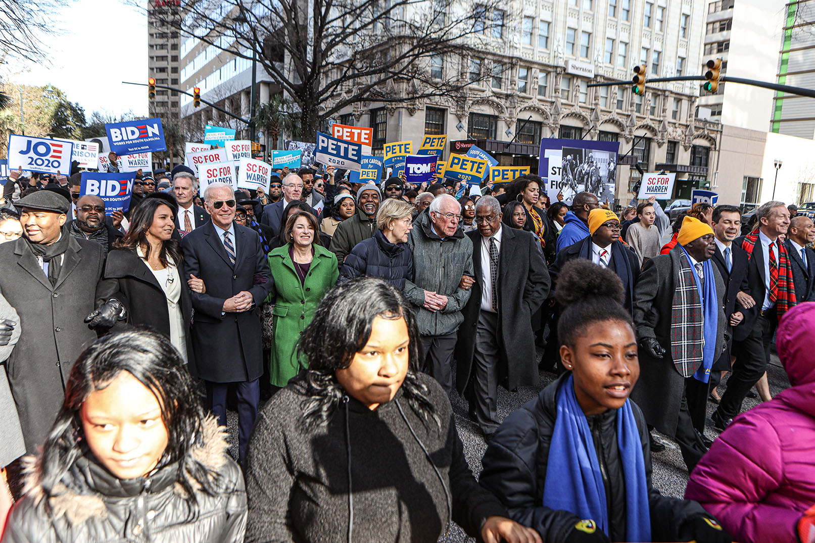 Democratic candidates for president march at King Day at The Dome Rally in Columbia, South Carolina a month before the "First in the South" primary election. Image by Perry McLeod / Shutterstock. United States, 2020. Democratic candidates for president march at King Day at The Dome Rally in Columbia, South Carolina a month before the "First in the South" primary election. Image by Perry McLeod / Shutterstock. United States, 2020.