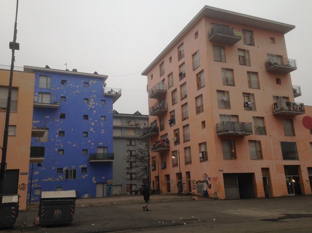 Abandoned athletes’ accommodation now occupied by migrants. Image by Claire Provost. Italy, 2016. Turin's Occupied Olympic Village