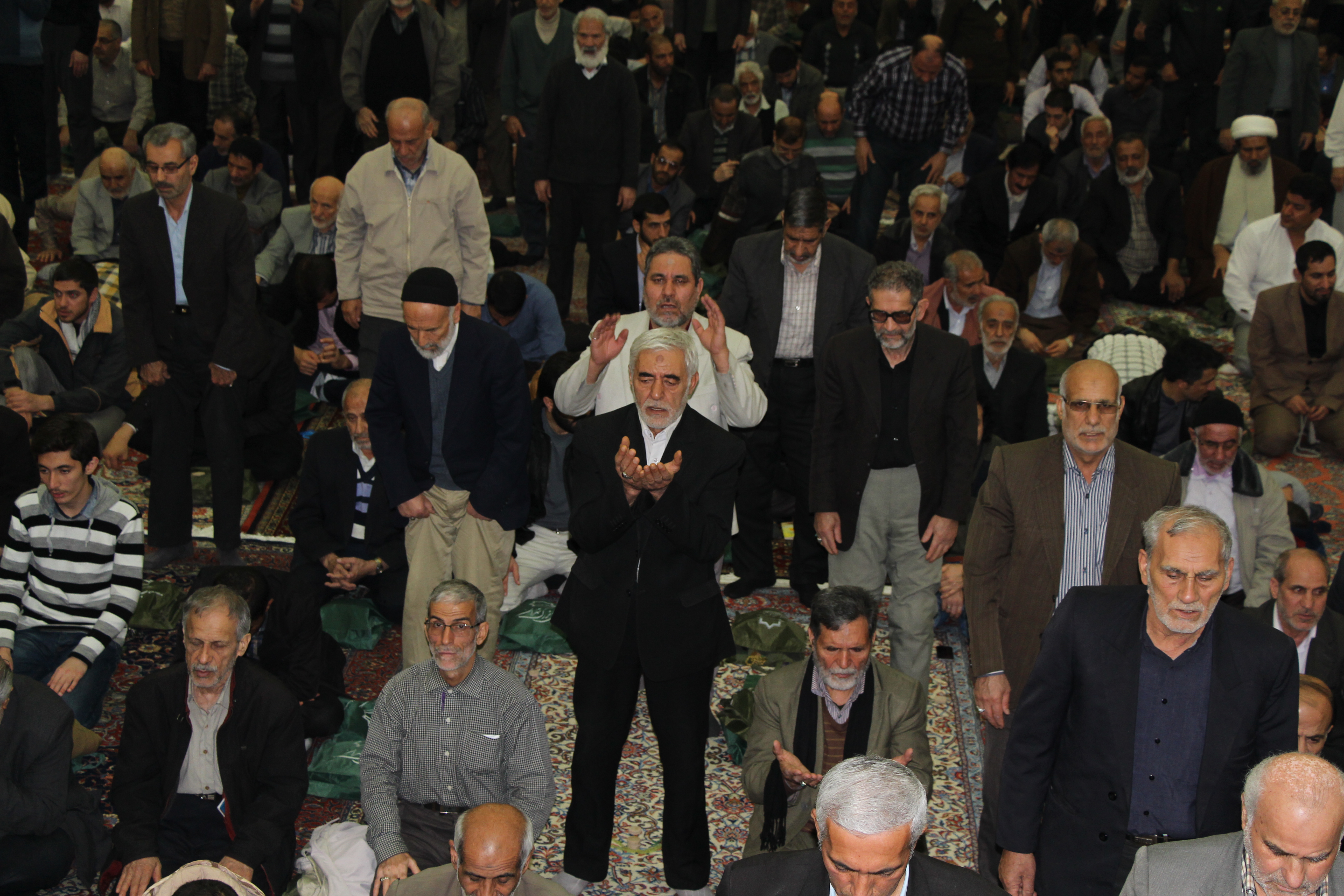 As Republican presidential candidates scramble to see who can bash Iran harder, Iranians worry the struggle for control of the United States government could undermine their nuclear deal with world powers. Image by Reese Erlich. Iran, 2016. Media file: fri_pray_1.jpg