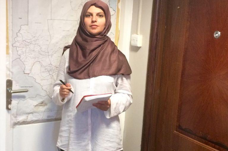 Reporter Kira Zalan preparing for an interview at the Islamic Fiqh Council in Khartoum, South Sudan. Reporter Kira Zalan preparing for an interview at the Islamic Fiqh Council in Khartoum.