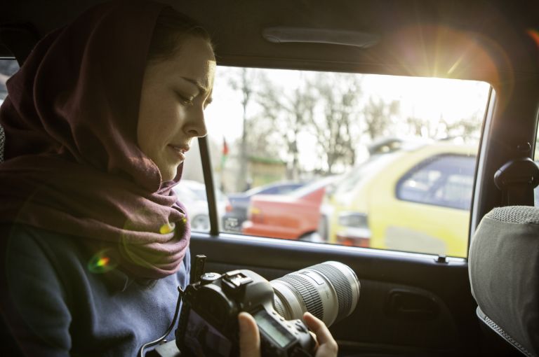 Op-Docs filmmaker Alexandia Bombach on location in Afghanistan. Her film "Afghanistan by Choice" premiered on Op-Docs in June, 2016. Image by Amin Palangi. Media file: img_4662.jpg