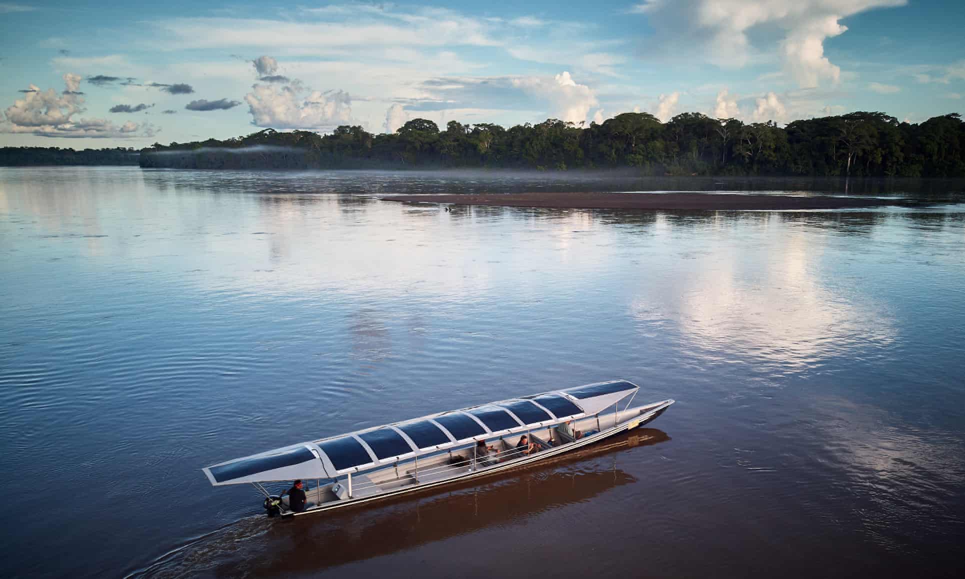 Sunkirum, one of the solar-powered canoes, sails on the Pastaza river. Image by Pablo Albarenga. Ecuador, 2020. Sunkirum, one of the solar-powered canoes, sails on the Pastaza river. Image by Pablo Albarenga. Ecuador, 2020.