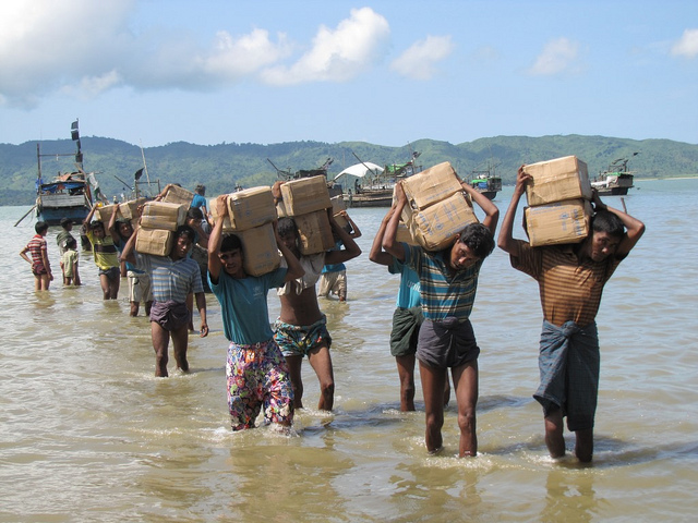 One IDP camp near Sittwe can only be accessed by sea with boats transporting vital aid supplies such as rice and cooking oil. Image by Mathias Eick (CC BY-ND 2.0). Myanmar, 2013. One IDP camp near Sittwe can only be accessed by sea with boats transporting vital aid supplies such as rice and cooking oil. Image by Mathias Eick (CC BY-ND 2.0). Myanmar, 2013.
