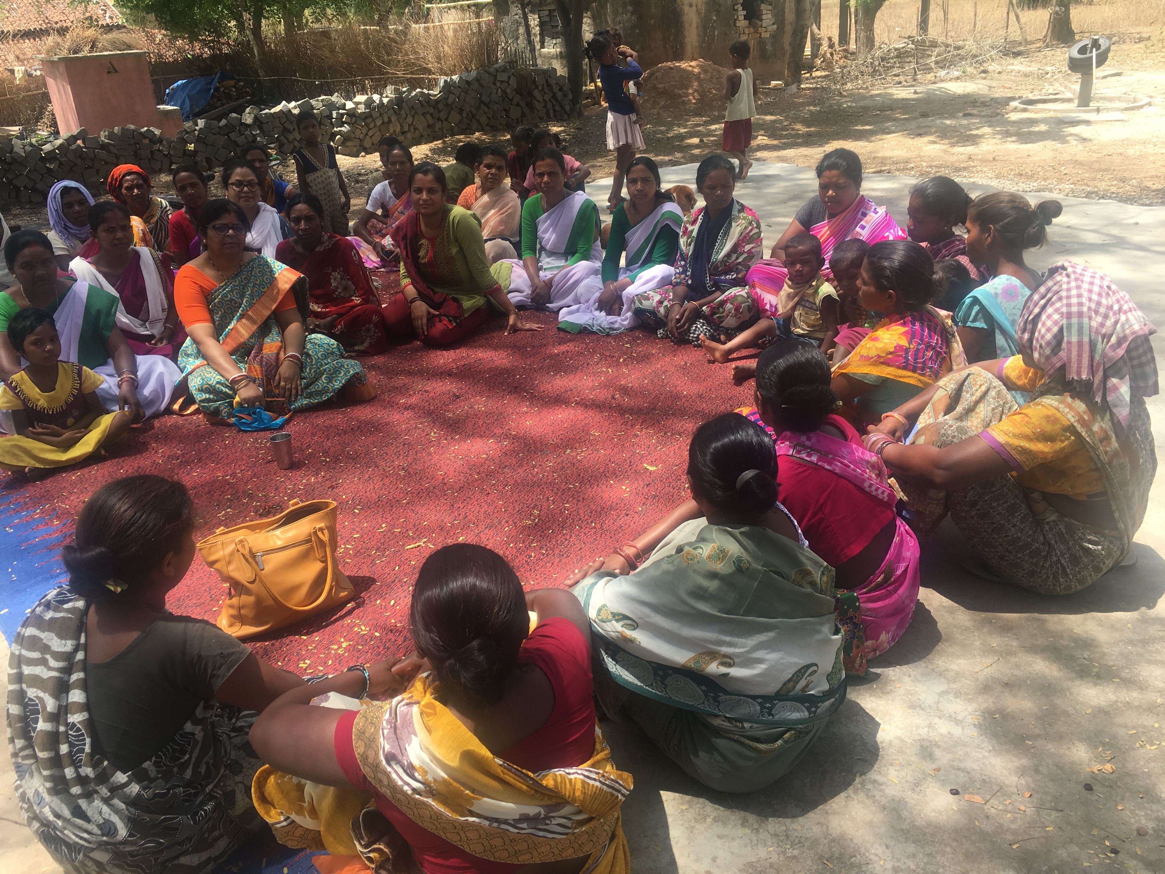 Women gather for saas bahu pati sammelan (meeting of the mother in law, daughter in law and husband) in the village of Khunti, Jharkhand, India. Image by Hannah Harris Green. India, 2018. Women gather for saas bahu pati sammelan (meeting of the mother in law, daughter in law and husband) in the village of Khunti, Jharkhand, India. Image by Hannah Harris Green. India, 2018.