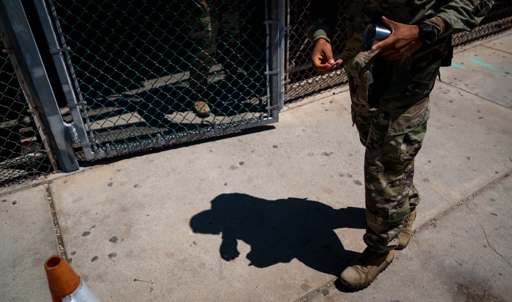 A military police officer leaving the Camp 6 detention center at Guantánamo Bay in April. The most secretive detention area, Camp 7, is off limits to the news media. Image by Doug Mills/The New York Times. Cuba, 2020. A military police officer leaving the Camp 6 detention center at Guantánamo Bay in April. The most secretive detention area, Camp 7, is off limits to the news media. Image by Doug Mills/The New York Times. Cuba, 2020.