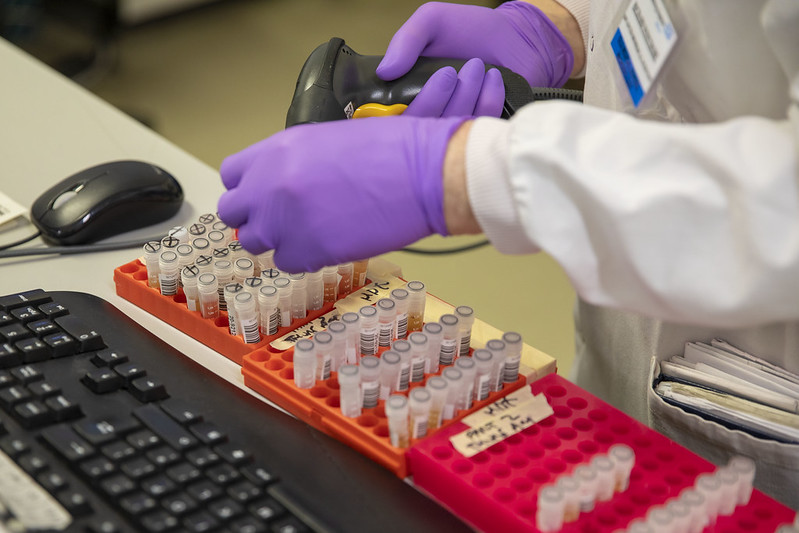 Researchers at a coronavirus testing laboratory in Leeds. Image courtesy of HM Treasury via Creative Commons. United Kingdom, 2020. Researchers at a coronavirus testing laboratory in Leeds. Image courtesy of HM Treasury via Creative Commons. United Kingdom, 2020.