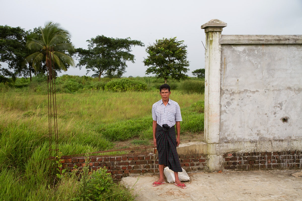 Farmer Koh Tun Oo stands on the property he lost near the Yangon Industrial Park zone. Image by Steve Sapienza. Myanmar, 2015. Media file: img_4299_corrected.jpg