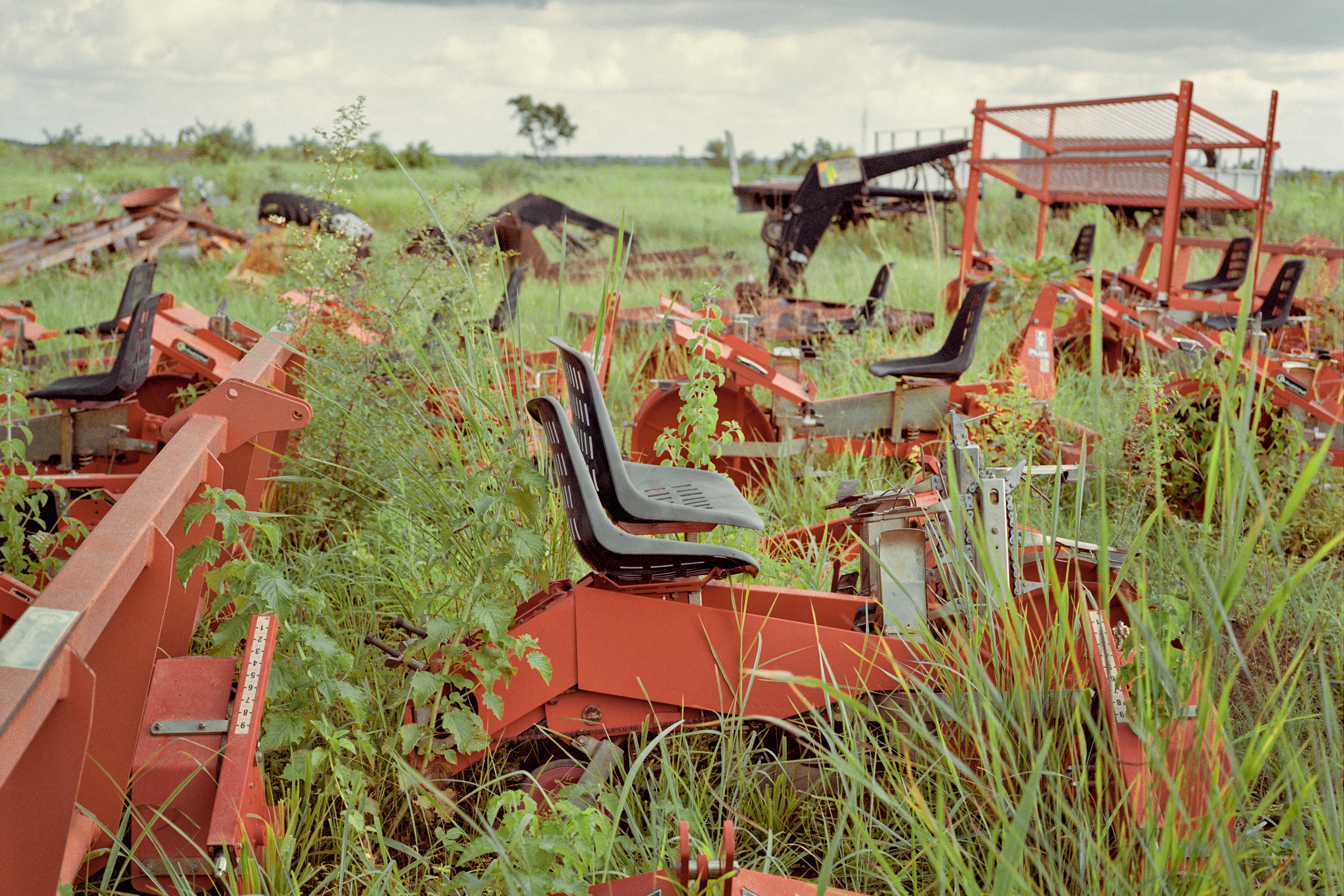 Abandoned tractors, Kpachaa, Northern Region, Ghana, 2013. The tractors, originally meant to harvest the jatropha plant, are left over from a failed biofuel project.