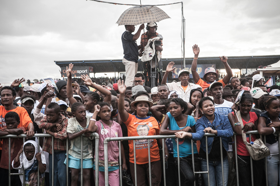 Supporters of presidential candidate Hery Rajaonarimampianina at a rally in the capital, Antananarivo, in December. Rajaonarimampianina was sworn into office on Jan. 25, ending a five-year political crisis sparked by a 2009 coup. Image by Rijasolo / Riva Press. Madagascar, 2013.
