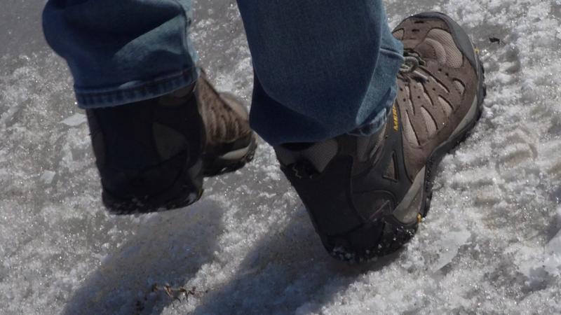 Farmers with their boots on the ground in South Dakota say the increase in snow and rain has changed how they farm. Image by Brad Van Osdel / South Dakota Public Broadcasting. United States, 2020. Farmers with their boots on the ground in South Dakota say the increase in snow and rain has changed how they farm. Image by Brad Van Osdel / South Dakota Public Broadcasting. United States, 2020.