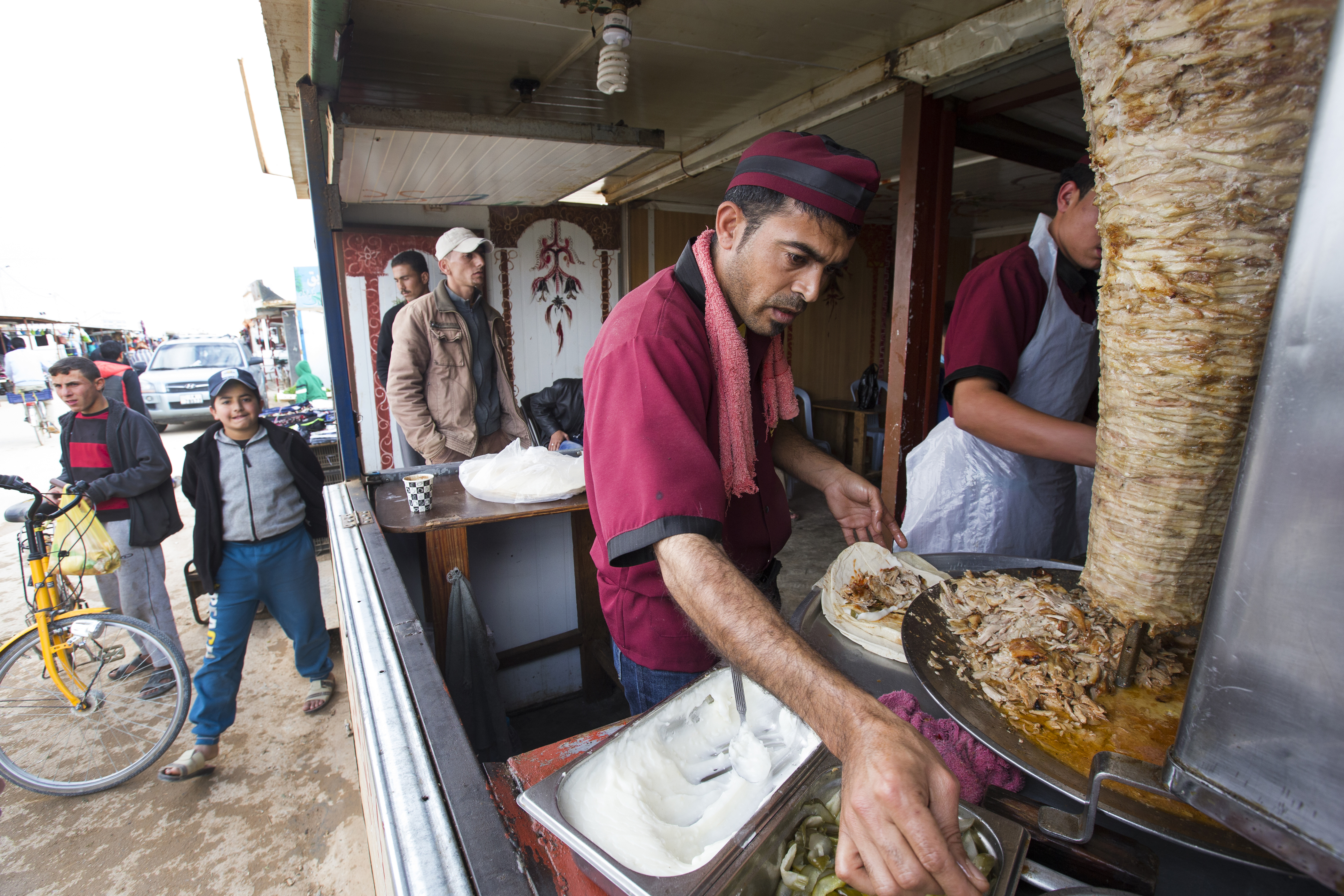 This shawarma shop feeds refugee families at affordable prices. Image by Mark Hoffman. Jordan, 2016. Media file: jordan_shawarma_hoffman.jpg