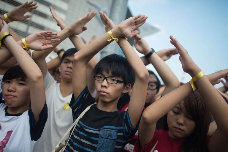 Joshua Wong Joshua Wong (center) leading pro-democracy protests in Hong Kong. Image by Anthony Kwan/Getty Images. China, 2014.