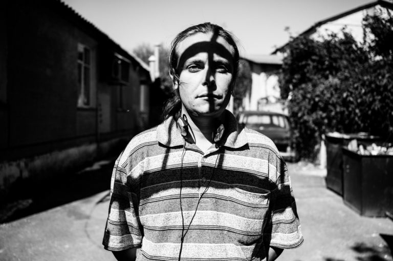 Georgiy—or Zhora, as he likes to be known—is a 28-year-old musician, who has been living in a dorm in Kiev since the summer. At first, he had to go to the clinic each day for his substitution therapy—a four-hour round trip. Image by Misha Friedman. Crimea, 2014. Georgiy—or Zhora, as he likes to be known—is a 28-year-old musician, who has been living in a dorm in Kiev since the summer. At first, he had to go to the clinic each day for his substitution therapy—a four-hour round trip. Image by Misha Friedman. Crimea, 2014.