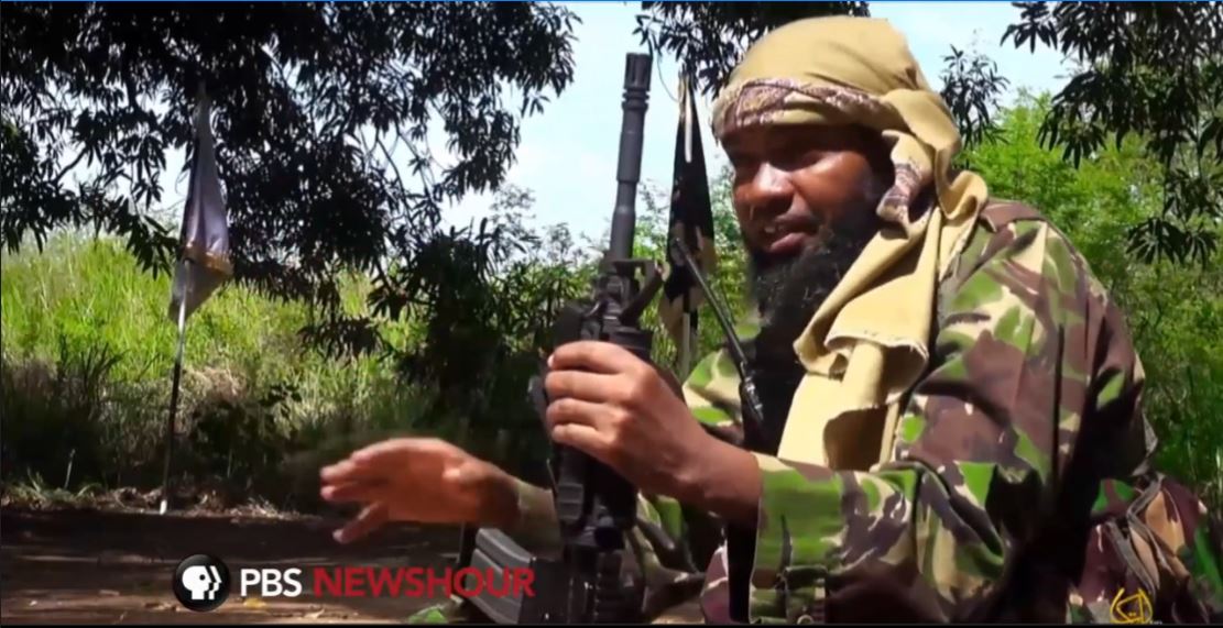 Still frame from PBS Newshour broadcast. Media file: pbs_schifrin_2.jpg