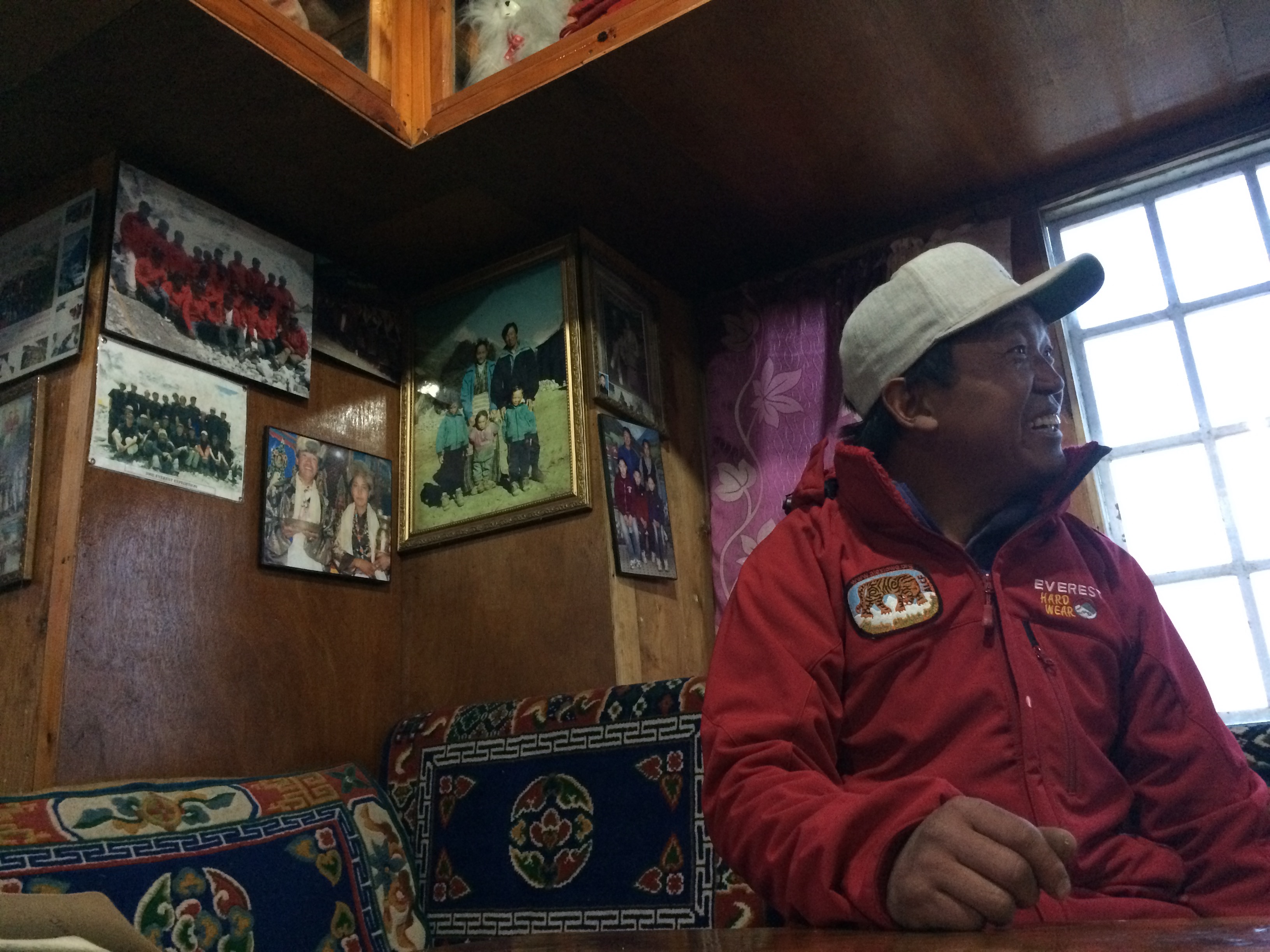 Panuru Sherpa in his guesthouse in Phortse. The dining hall in guesthouses is a main meeting place. Image by Jeremy Rellosa. Nepal, 2016. Media file: sharp_2.jpg