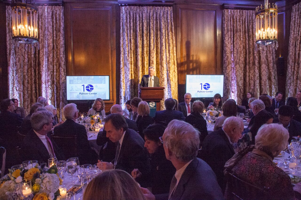 Jon Sawyer welcomes guests at the Pulitzer Center 10th anniversary celebration at the Harold Pratt House in New York. Image by Jin Ding. New York, 2016. Media file: unspecified.jpg